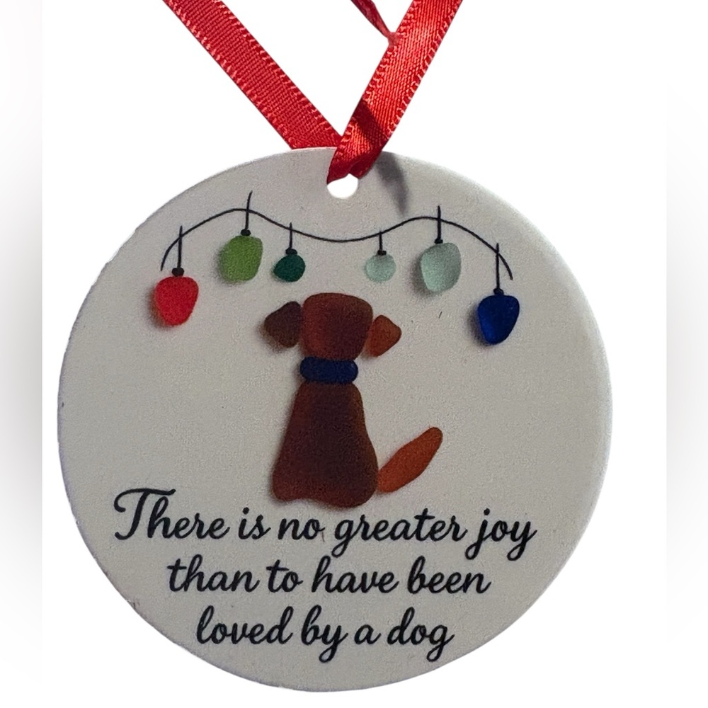 New- Christmas ornament featuring a dog design made to look like sea glass.
